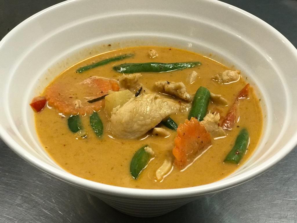 Panang Curry · Served with spicy curry paste, coconut milk, bell pepper, string beans, pineapple and carrot. Medium spicy. Served with jasmine rice.