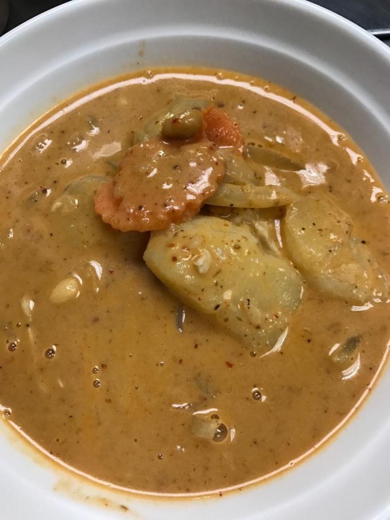 Massaman Curry · Served with sweet and mild curry paste, coconut milk, onion, potato, carrot and peanuts. Medium spicy. Served with jasmine rice.