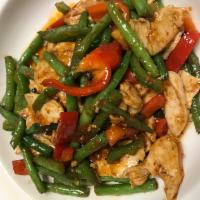 Red Hot String Bean · Sauteed with string bean, Thai curry paste, bell pepper and chili. Medium spicy. Served with...