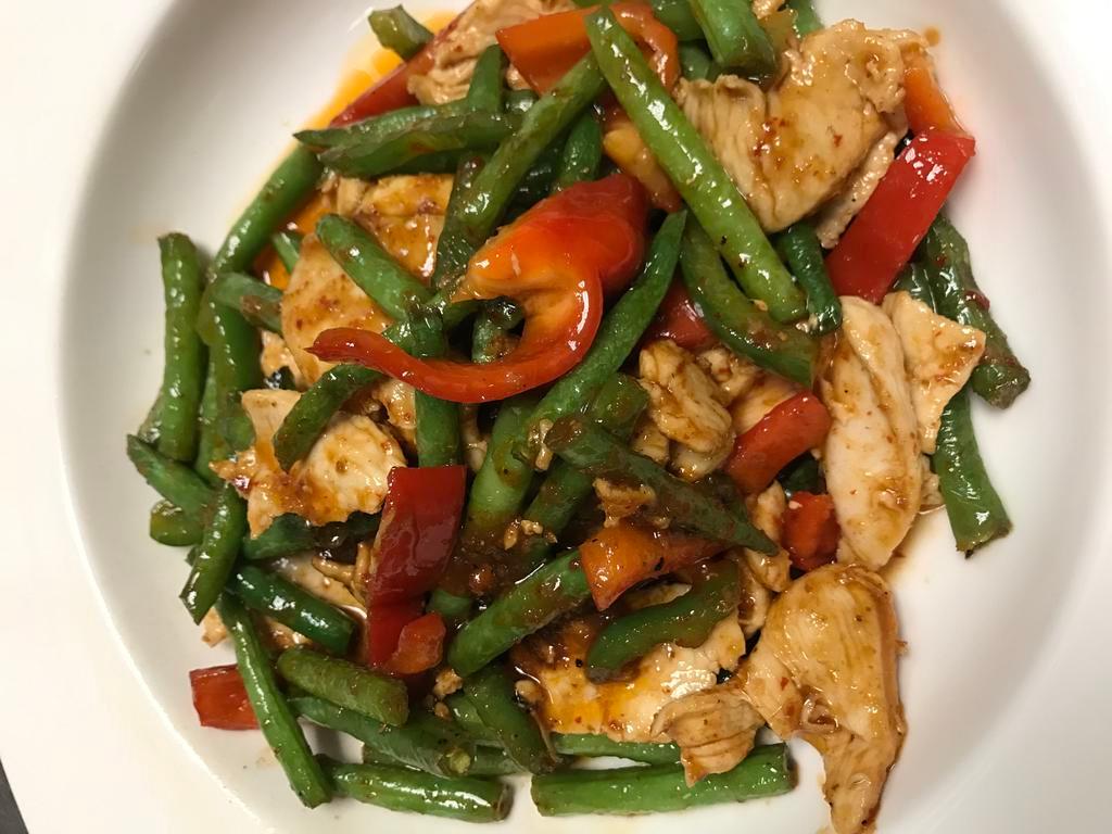 Red Hot String Bean · Sauteed with string bean, Thai curry paste, bell pepper and chili. Medium spicy. Served with jasmine rice.