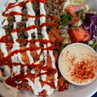 Combo over Rice  · Lamb and chicken served with white sauce and hot sauce 