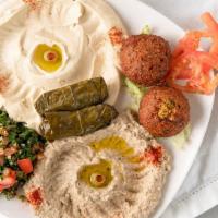 + Veggie Meza Sampler · Sampler of Hummus, Baba Ganoush, 2 Falafel, 2 Veggie dolma, side Greek Salad with Tzatziki a...