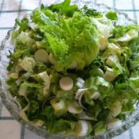 Marouli Salad · Romaine hearts, fresh scallions, dill and feta arachovas with extra virgin olive oil.
