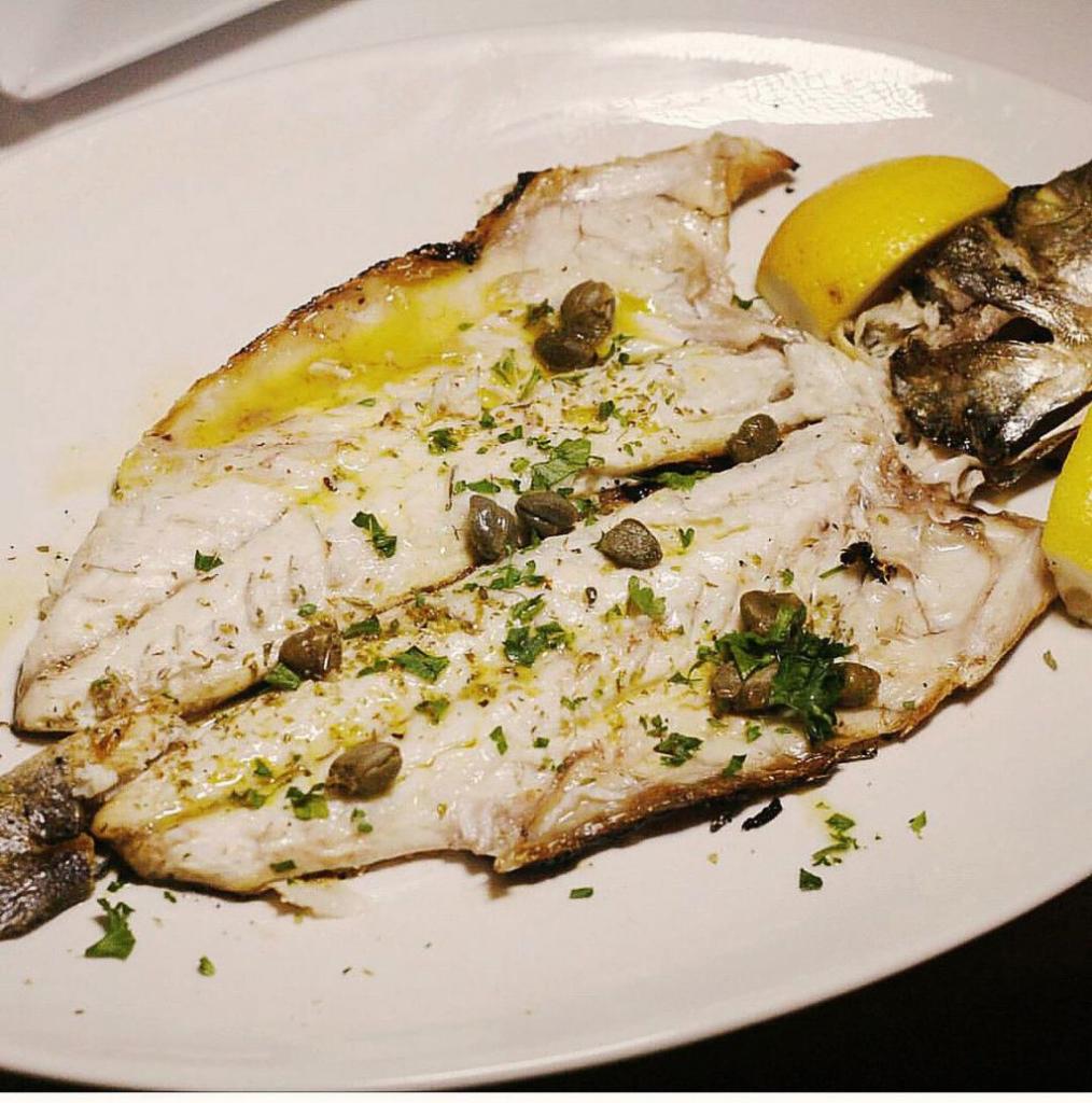 Lavraki · Imported whole Bronzini lean white fish with mild moist tender flakes.