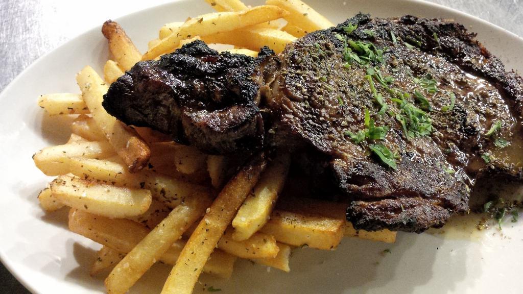 Brizola · 16 oz. charcoal grilled black Angus rib eye steak and Greek style fresh cut fries.