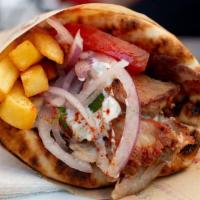 Gyros Sandwich  · The best pork Gyros in NYC served in pita bread with tzatziki, tomatoes and onions