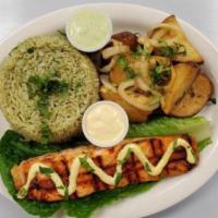 Grilled Salmon · Salmon marinated in anticuchera sauce. Served with special sauce on the top and two small si...