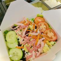 Chef Salad · Romaine, feta, salami, pepperoni, Canadian bacon, sliced onions, green peppers, olives, mush...