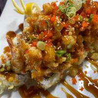 The Miyoshi · Craw fish, pop corn baby lobster. In: shrimp tempura, crab, avocado, cucumber roll topped wi...