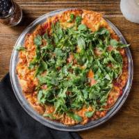 Prosciutto Arugula Pizza · Roma tomato sauce, Parmigiano, mozzarella cheese, prosciutto, arugula and extra virgin olive...