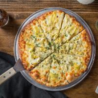 Artichoke Pizza · Parmigiano, mozzarella, shaved artichoke, garlic, lemon and extra virgin olive oil.