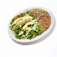 Taco Dinner · 2 tacos (chicken, beef, or shrimp), lettuce, tomatoes, red onions, and avocado. Served with ...