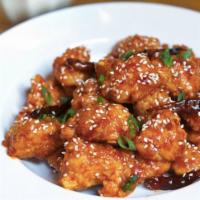 P10. General Tso’s Chicken 左宗棠雞 ·  sweet and spicy sauce poured over the crispy, juicy chicken