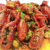 Stir Fried Lobster  霸王炒龙虾 · Stir-fried half lobster with house special ingredients  