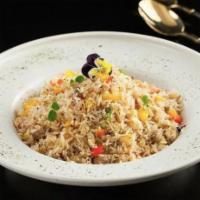 Fried rice with crab meat and black truffle 黑松露蟹肉带子炒饭 · black truffle, crabmeat, and eggs 