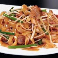 Stir-Fried Rice Noodles with Beef 干炒牛河 · stir-fried rice noodles with sliced sauteed beef 