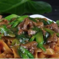 Stir-Fried Rice Noodles 湿炒牛河 · sire-fried rice noodles with sauteed beef 