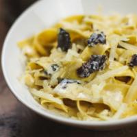 Tagliatelle · Black truffle cream sauce and truffle pecorino cheese