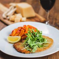 Veal Milanese · Pan seared breaded veal served with a side of spaghetti in a tomato sauce, or salad.