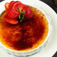 Creme Brulee · Creme Anglaise topped with caramelized sugar.