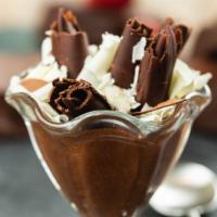 Chocolate Mousse · Chocolate fudge and whipped cream.