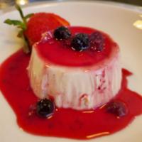 Panna Cotta · Sweetened cream thickened with gelatin and aromatized with vanilla. Topped with a compote ma...