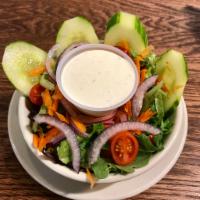 Side Salad · Mixed greens and romaine topped with tomato, cucumber, red onion, carrot and pepperoncini wi...