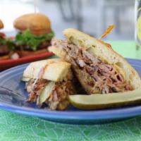The Cuban Sandwich · Pulled pork and ham, Swiss cheese, dill pickle and Dijon mustard. Served on ciabatta roll. S...