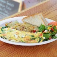 Feta Cheese, Spinach and Tomato Omelette Platter Breakfast · With home fries or hash browns and toast.