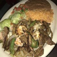 Fajitas Bundle Combo · Served with rice and beans and homemade flour or corn tortillas. Served with your choice of ...