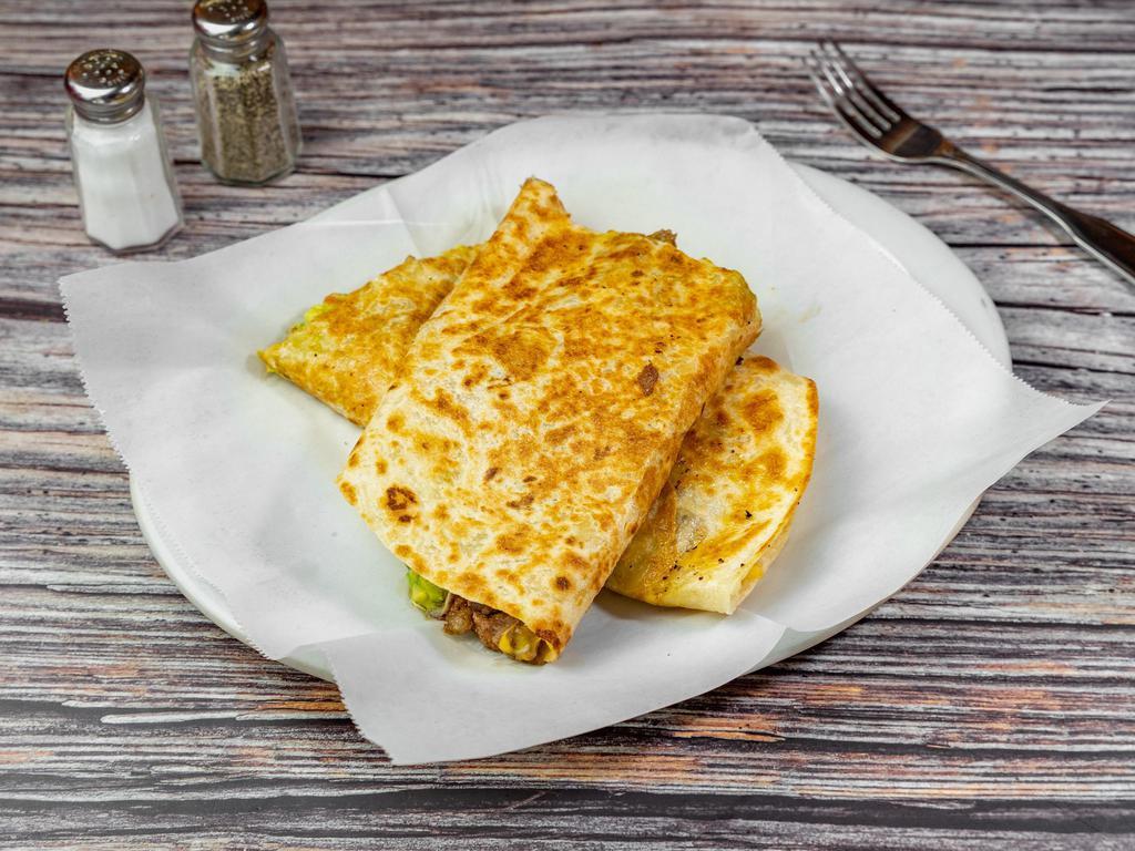 Quesadilla Suiza · Flour tortilla with any meat, cheese, and salsa.