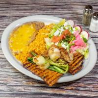 Steak Special Plate · Grilled steak with green onions, rice, beans, sour cream, guacamole, salad, and corn tortill...