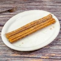 Churros · Deep fried pastry strips, rolled in sugar, and cinnamon.