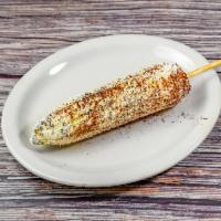 Elote · Grilled corn with mayo cheese and chili.