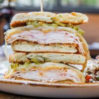 The Hot Mess Sandwich · Smoked turkey, white cheddar, caramelized onions, pickled jalapenos, au jus, hoagie roll