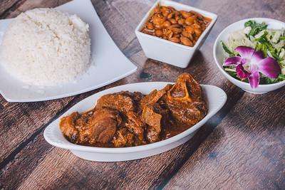 Chivo Guisado Order · Goat stew packaged separately.  Free House Salad