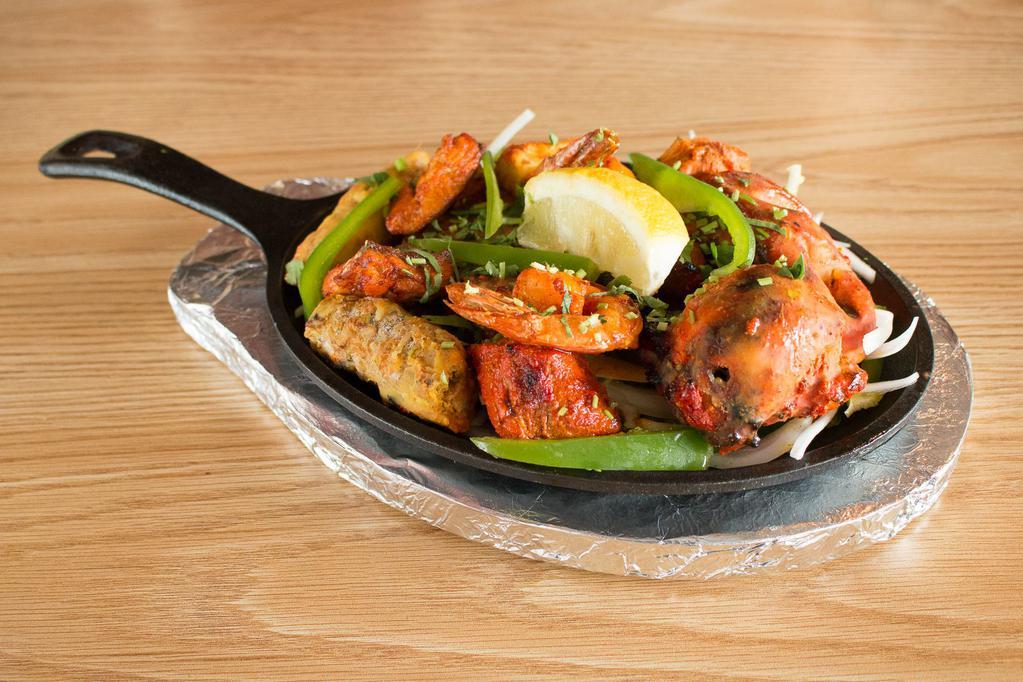Mixed Tandoori Platter · An assortment of Tandoori specialties, including five different Tandoori items: Chicken Tikka, Paneer Tandoori, Lamb Boti Kabab, Salmon Tandoori, and Shrimp Tandoori.