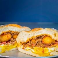 Lucas Breakfast Sandwich · Double Egg, Bacon, Chili, Cheese, Potato and Ketchup.