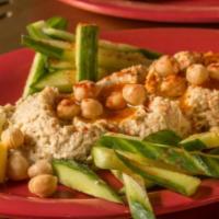 Hummus  · Babajoon's in-house-made recipe of creamy spread made from chickpeas, sesame seeds, extra vi...