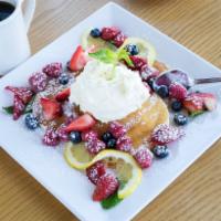 Lemon Ricotta Pancakes · Three lemon ricotta pancakes - topped with blueberries, raspberries, strawberries & homemade...