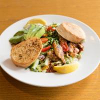 Southwest Chicken Salad · House blend of greens tossed with cilantro caesar dressing - topped with marinated chicken b...