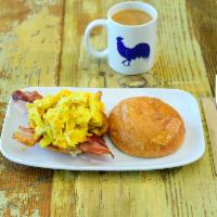 Evelyn · 3 whisked eggs, bacon, cheddar, and house roll.