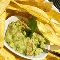 Moises · Freshly hand cut plantain chips. Served with homemade guacamole.