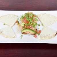 Jerico · Pan-Seared Salmon topped with Avocado, Scallions, Tomato and Cilantro on top of bed of Sweet...