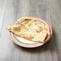 Garlic Naan · Whole bread topped with chopped garlic and cilantro.