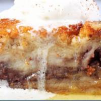 Bread Pudding Dinner · Served warm and topped with homemade whiskey sauce, whipped cream, and fresh fruit.
