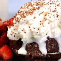 Lava Cake Dinner ·  Warm chocolate lava cake topped with whipped cream, chocolate shavings, fresh fruit, and va...