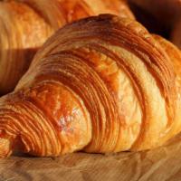 Croissant · Freshly baked flaky butter croissant.