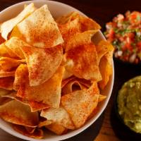 Guacamole and chips · Avocados, tomatoes, onion, cilantro, lime. 
Housemade Chips