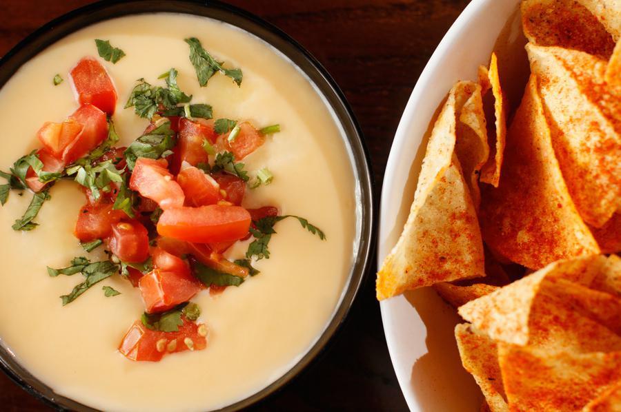 Queso and Chips · Fresh Queso (no preservatives or additives) and Swanky's signature house made chips
